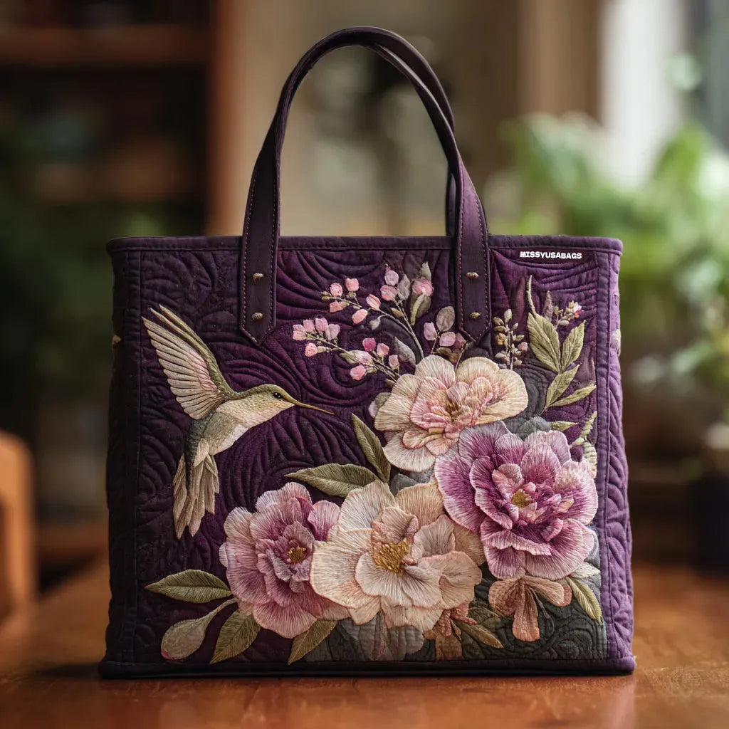 LILIAN | HANDCRAFTED PURPLE PADDED BAG WITH HUMMINGBIRD AND ORCHIDS
